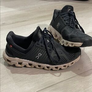 On Running Black and Tan Athletic Shoes